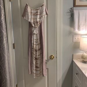 Off the shoulder rayon tie dye jumpsuit.Faux tassel tie in front.